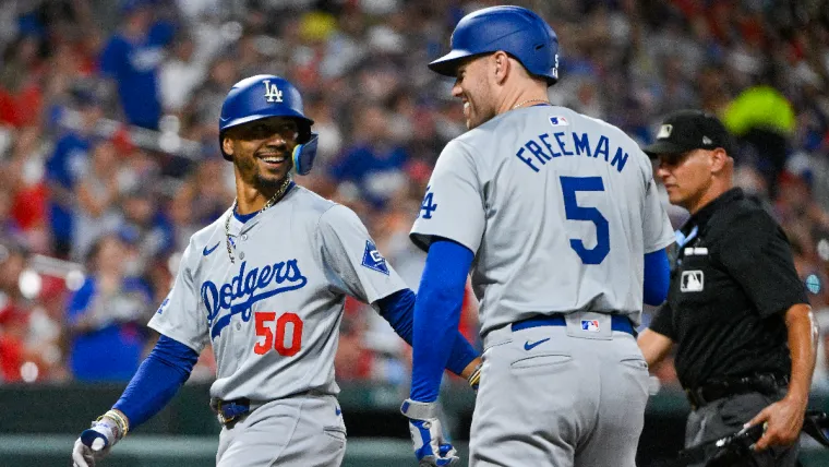 Aug 16, 2024; St. Louis, Missouri, USA; Los Angeles Dodgers right fielder Mookie Betts (50) celebrates with first baseman Freddie Freeman (5) after hitting a solo solo home run against the St. Louis Cardinals during the sixth inning at Busch Stadium. Mandatory Credit: Jeff Curry-USA TODAY Sports