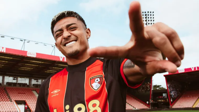 Julian Araujo poses after signing for Bournemouth