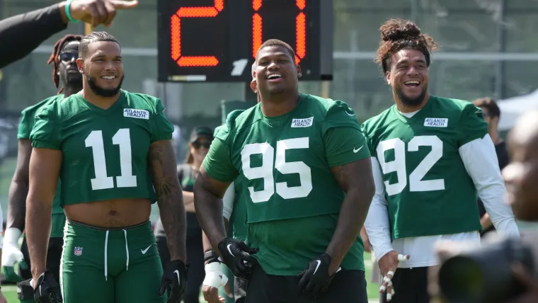 DT Quinnen Williams (95) with two linemates