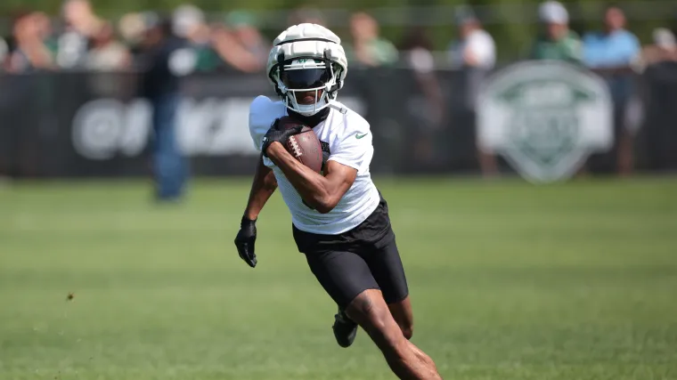 Garrett Wilson turns upfield at practice