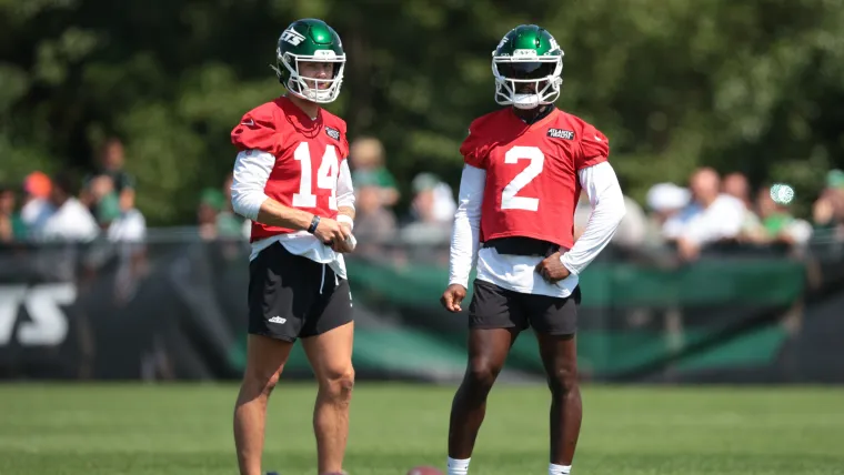 Tyrod Taylor (2) and Andrew Peasley (14) at training camp