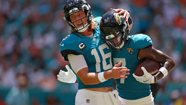 Trevor Lawrence, left, and Brian Thomas Jr. of the Jacksonville Jaguars 