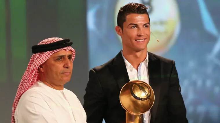 Cristiano Ronaldo with a Globe Soccer Awards trophy