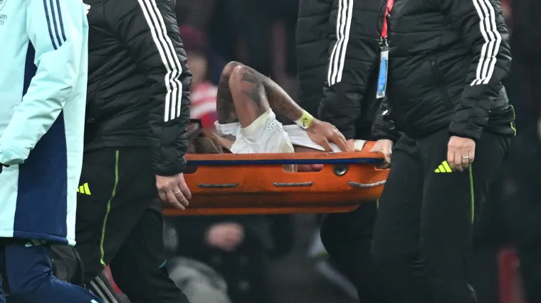 Gabriel Jesus of Arsenal is stretchered off with an injury