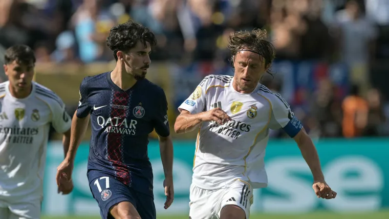 Vitinha of PSG and Luka Modric of Real Madrid