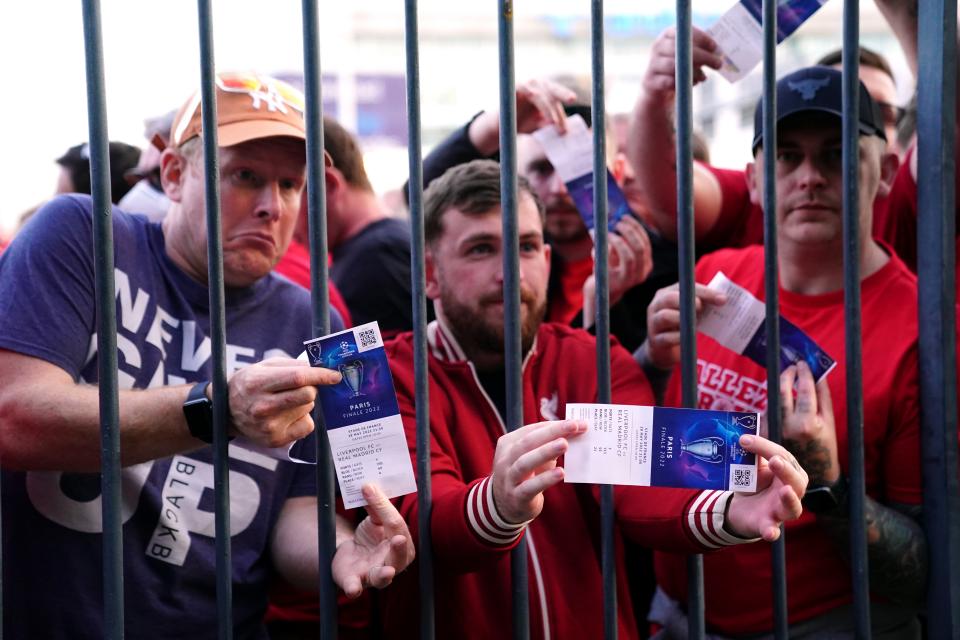 Fans queue outside the Stade de France