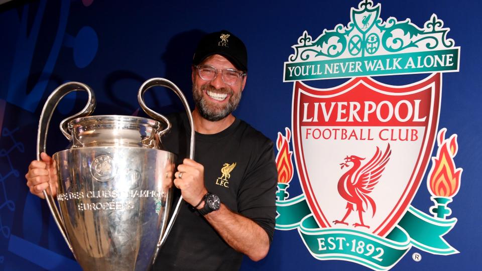 Jurgen Klopp celebrates with the UEFA Champions League trophy in 2019